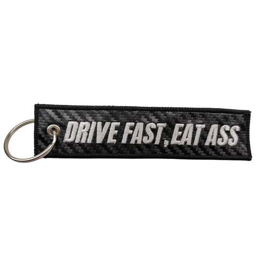 "Drive Fast, Eat Ass" Carbon Fiber Keytag